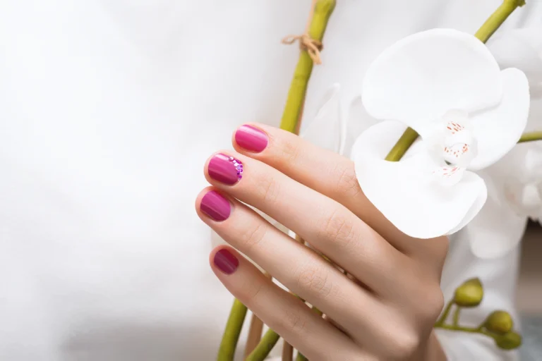 pink-nail-design-female-hand-with-glitter-manicure