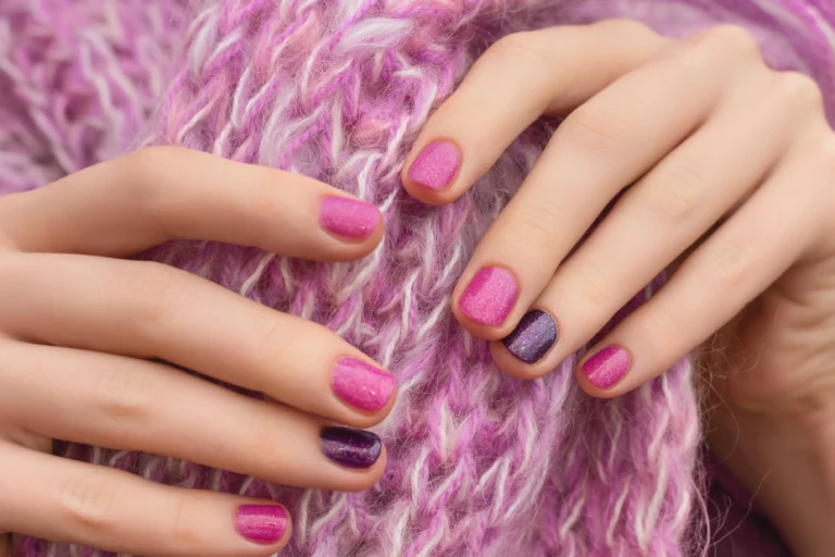 pink-nail-design-manicured-female-hands-pink-background
